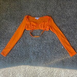 Going out top. Color orange. From a boutique on college campus.